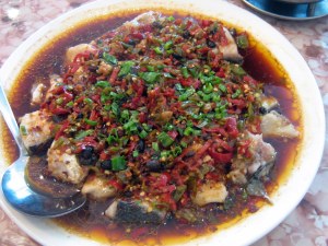 Fish head with minced peppers